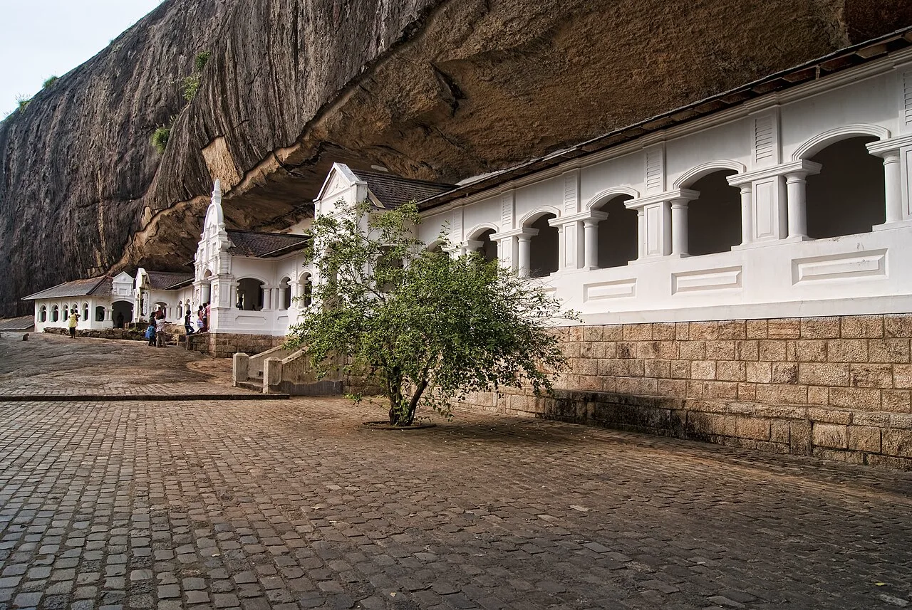Interior view of the Dambulla Cave Temple showing Buddha statues and cave architecture