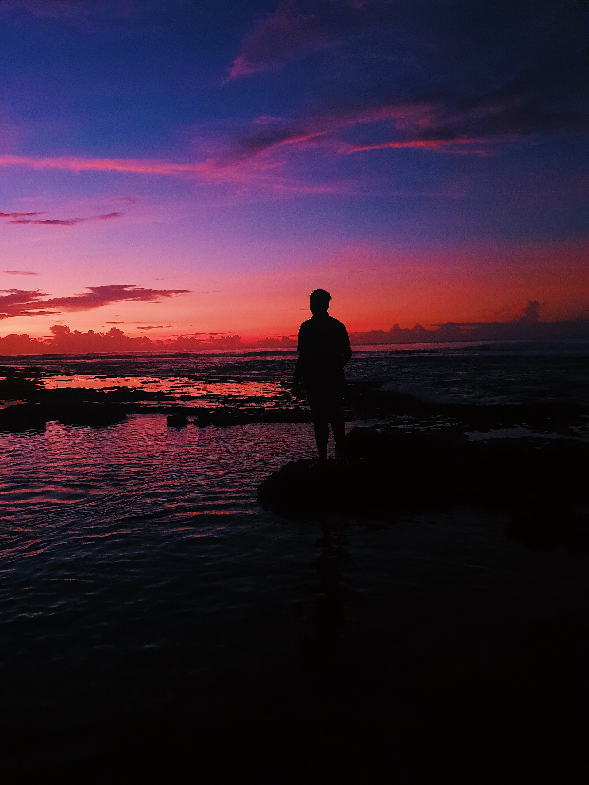 A child on a Sri Lankan beach at the water's edge — calm, shallow bays are the easiest and most rewarding toddler activity on the island