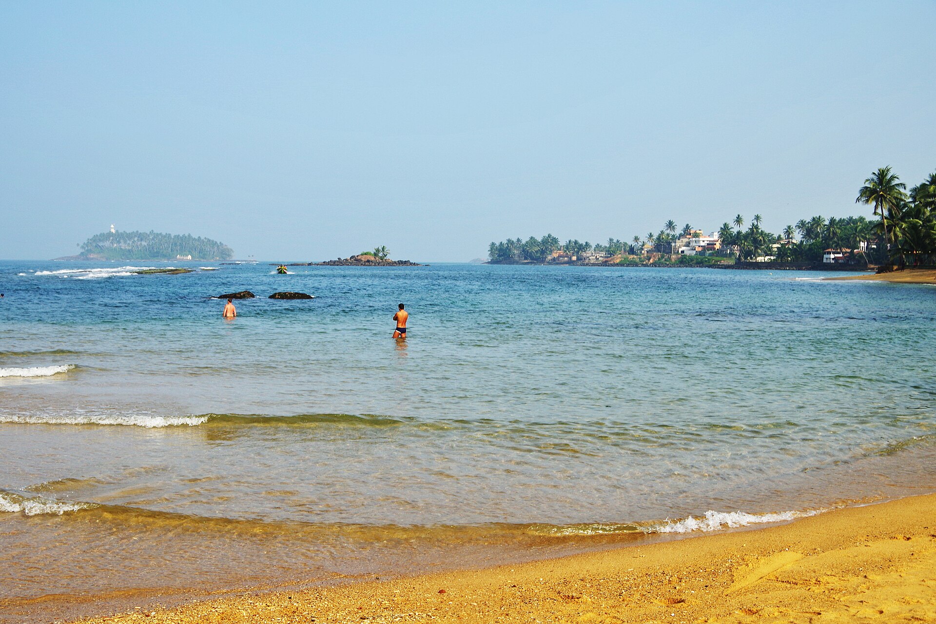 Palm-lined stretch of Beruwala beach on the west coast of Sri Lanka