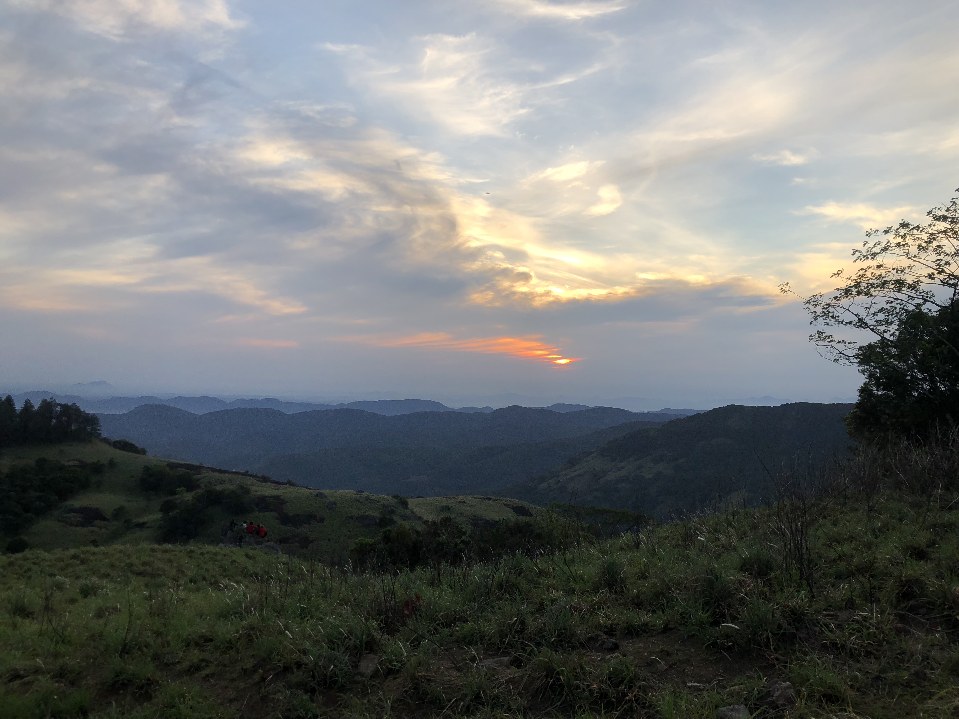 Sunrise over the Knuckles Mountain Range with golden light spreading across misty peaks
