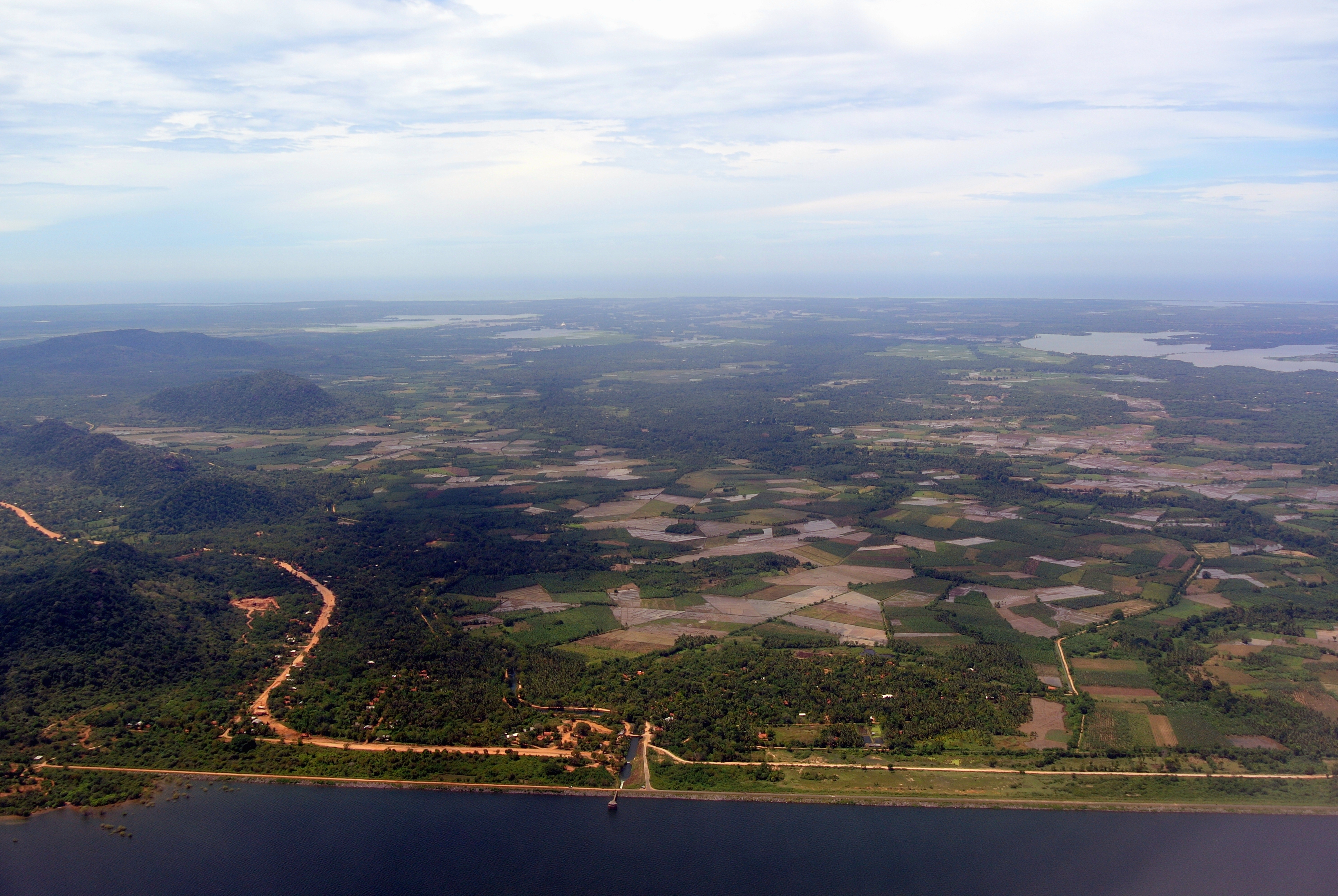 Aerial view of Sri Lanka's southern coastline showing tropical vegetation and beach