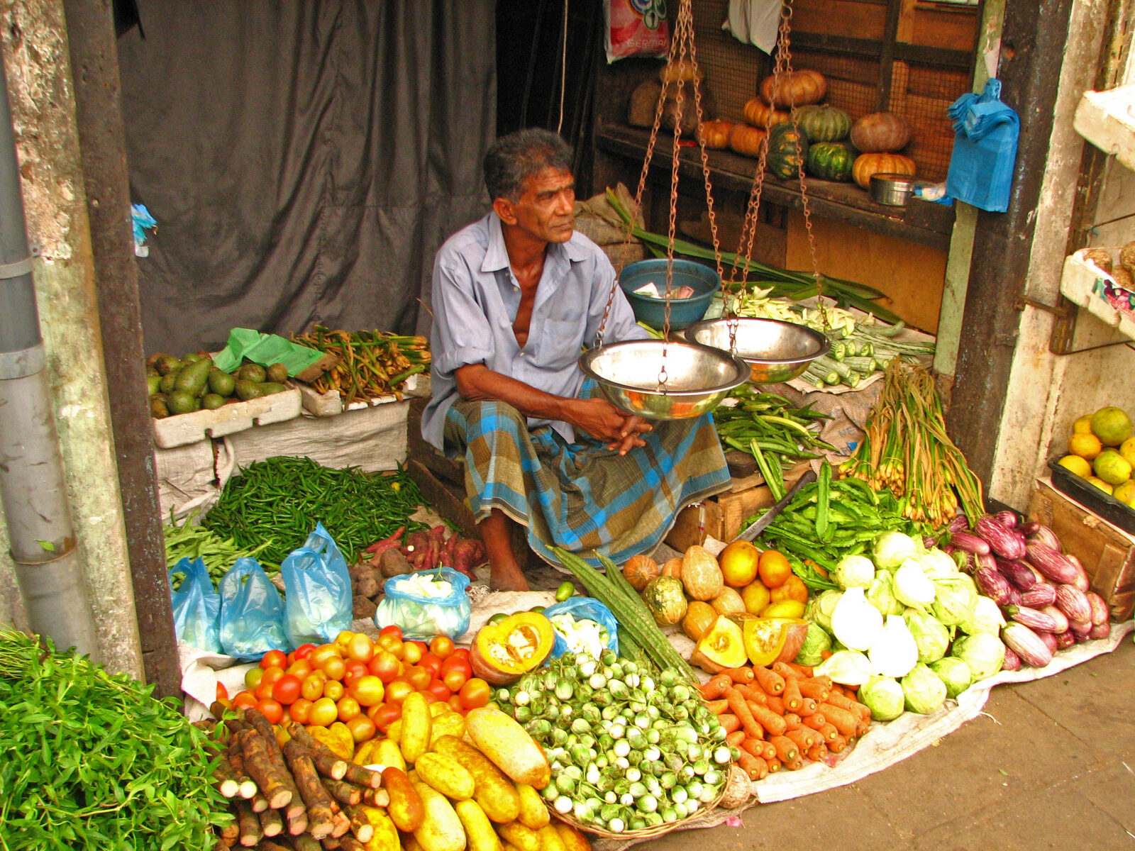 Colourful stalls at Kandy Market Hall - one of the best places to buy souvenirs in Sri Lanka