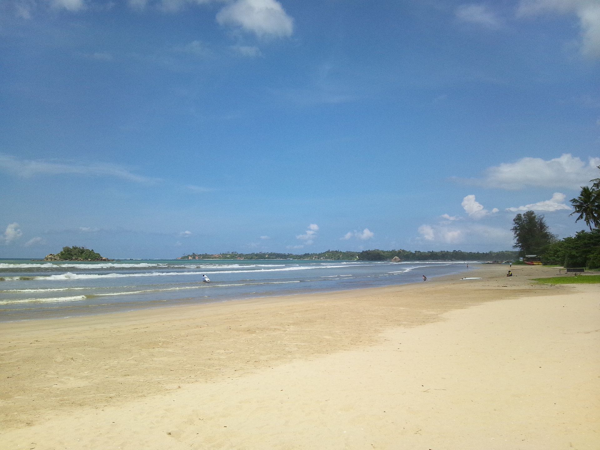 Weligama beach, a wide golden bay on Sri Lanka's south coast